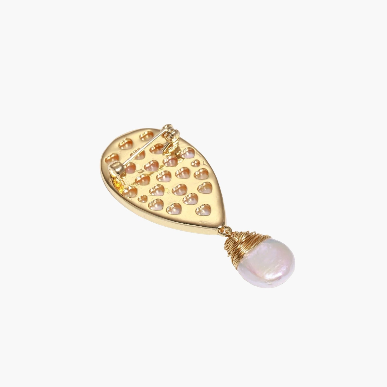 Iridescent shell brooch with gold bird accent and wire-wrapped baroque pearl drop on cream background.