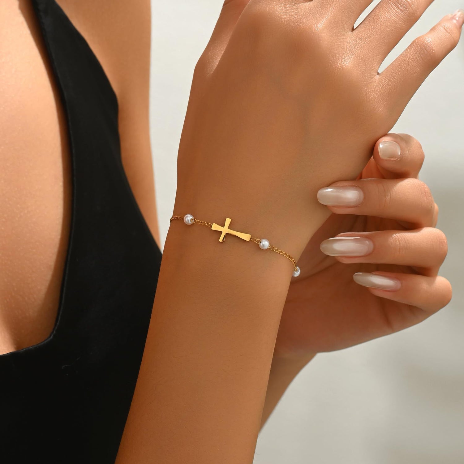 Pulseira com Cruz e Pérola em Aço Inoxidável