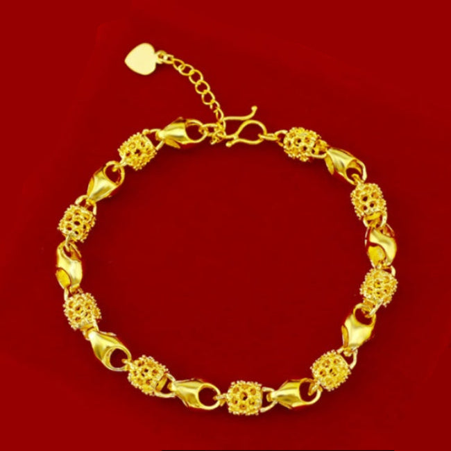 Pulseira Dourada com Detalhes Ornamentados