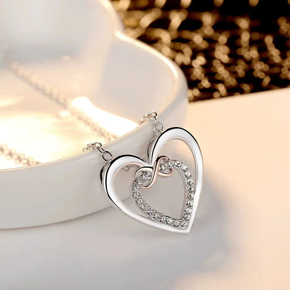 Collar de corazón con infinito